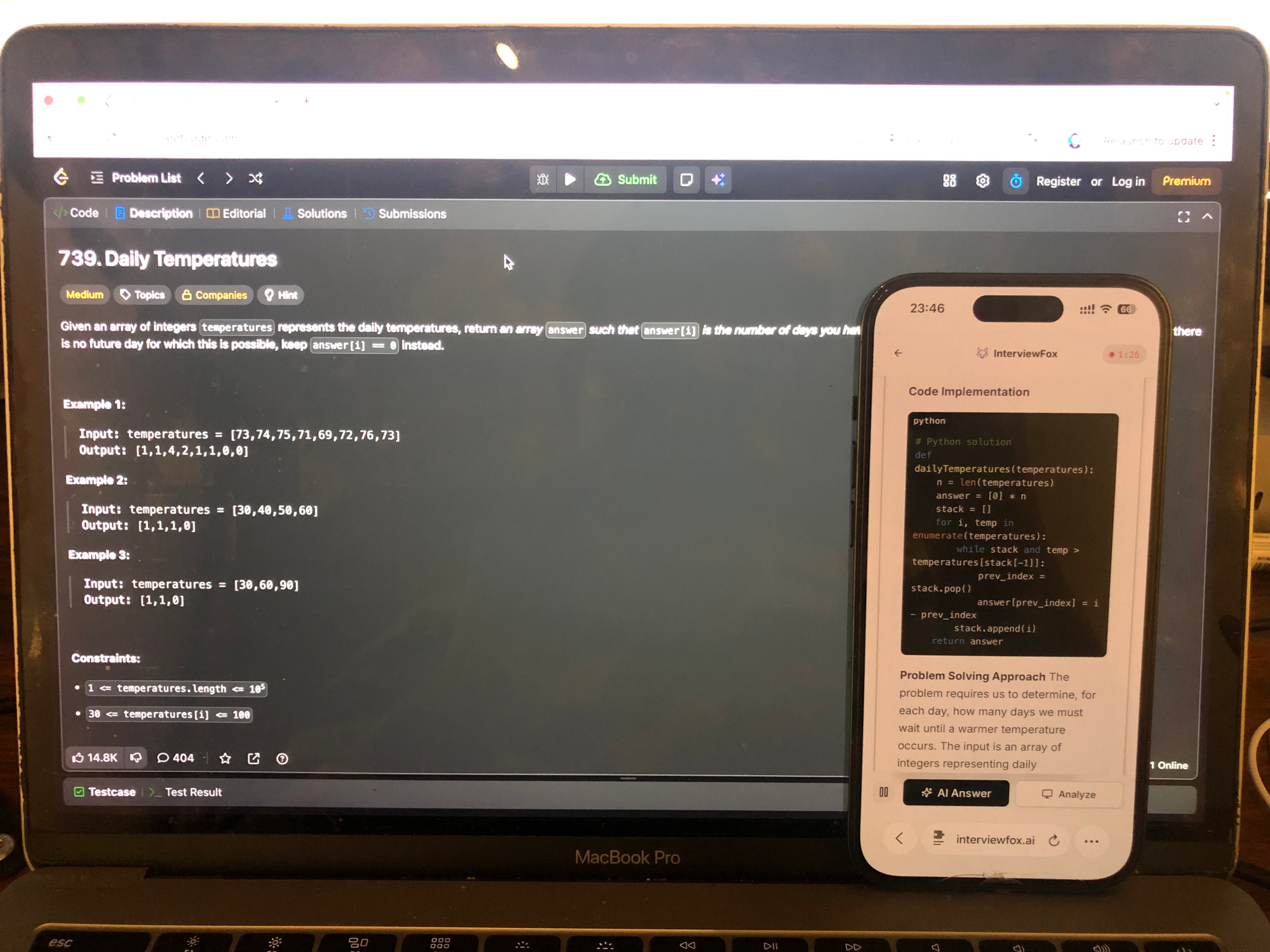 LeetCode problem on laptop, InterviewFox solution on phone. The shared screen never shows the phone