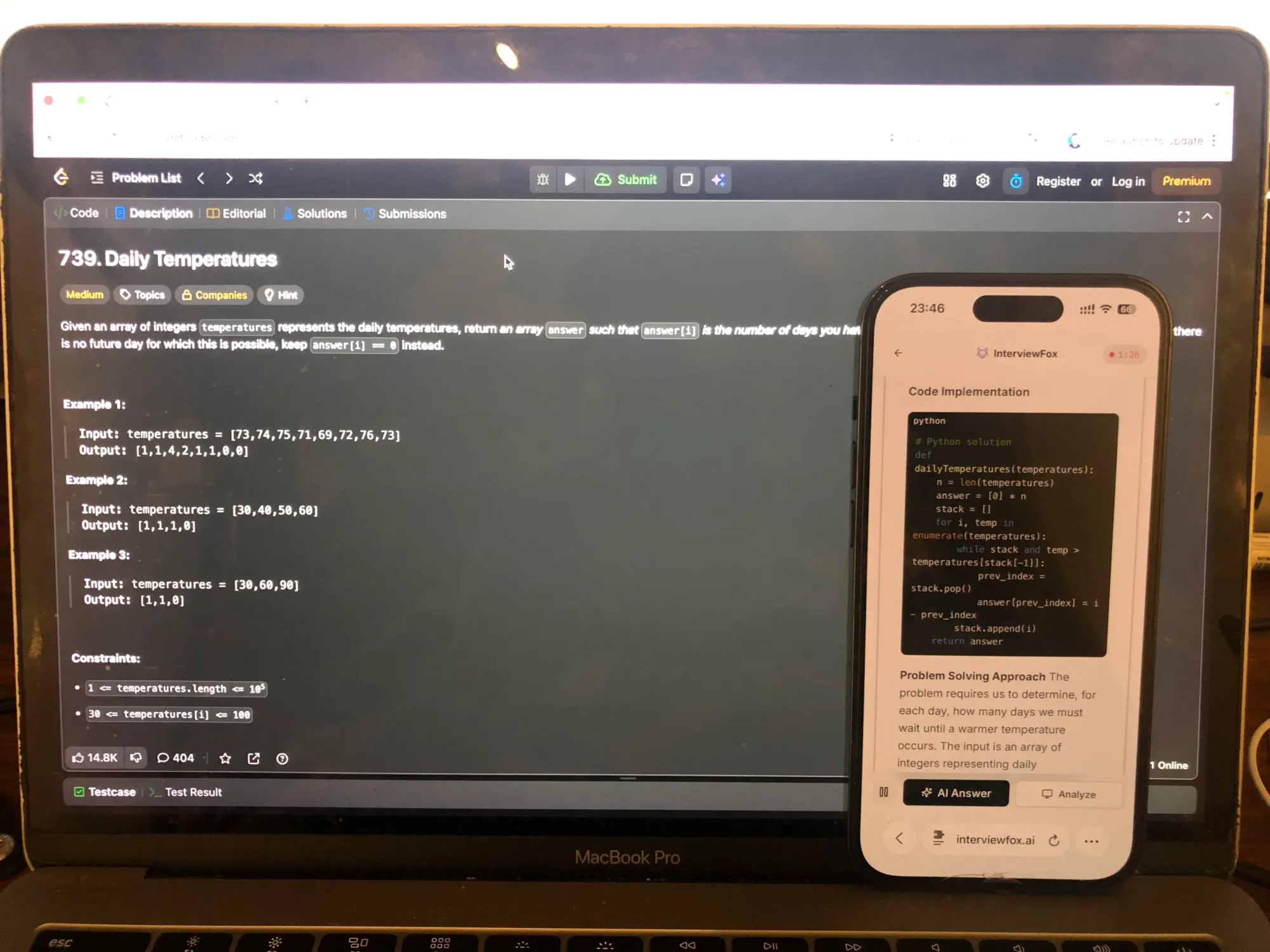 LeetCode problem on laptop, InterviewFox solution on phone — the shared screen never shows the phone